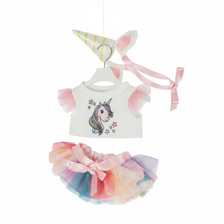 Doll outfit with unicorn shirt and colorful tutu skirt on a white background